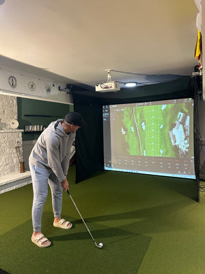 The SportScreen VANISH Series Retractable Golf Simulator Enclosure