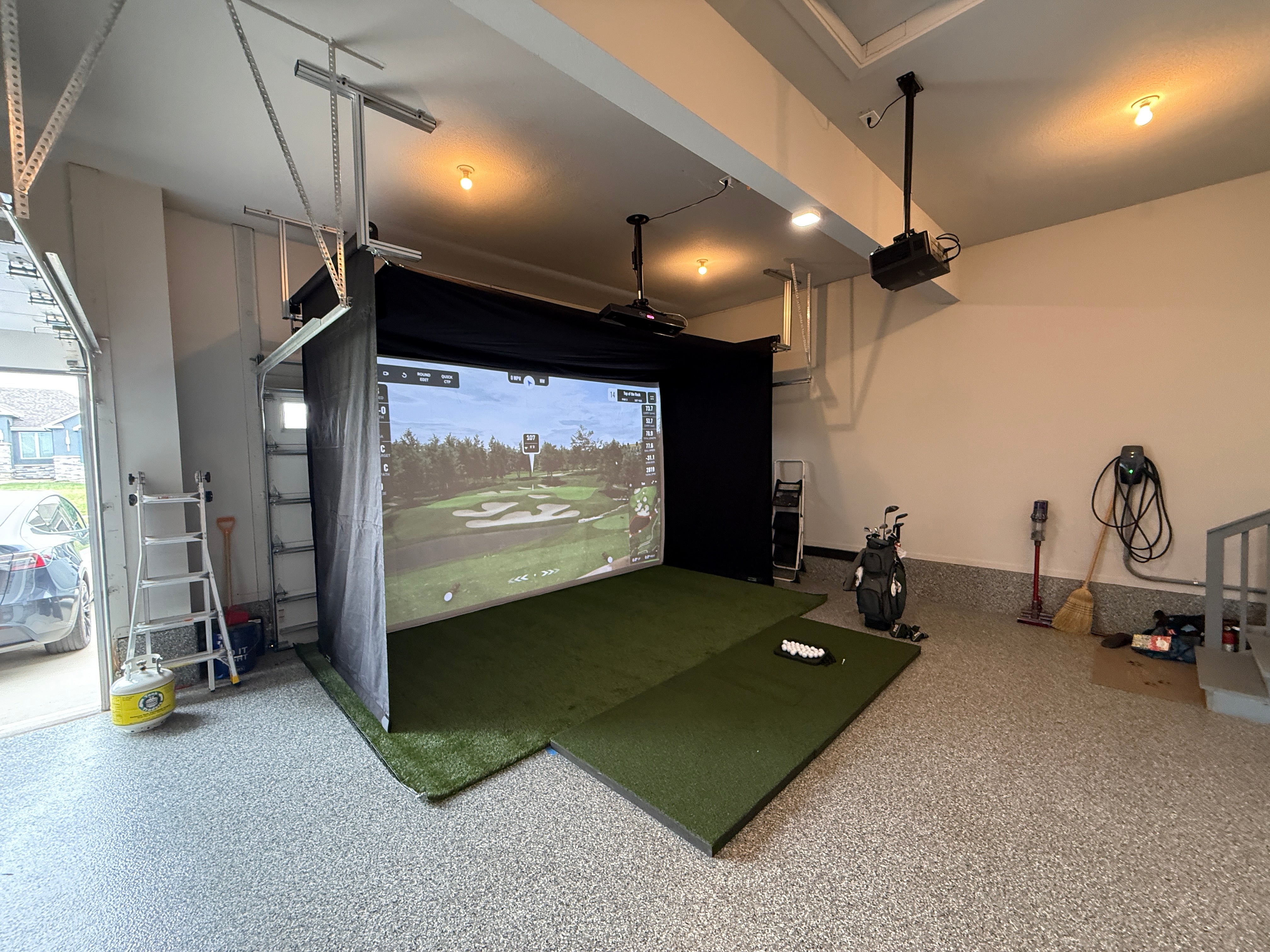 The SportScreen VANISH Series Retractable Golf Simulator Enclosure